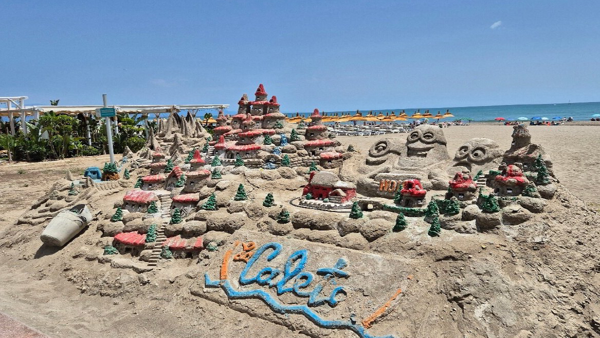 Sand kunst på stranda